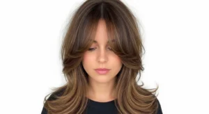 long wolf cut with soft ends and curtain bangs