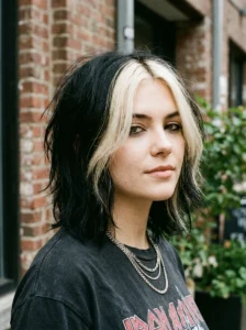 Classic black and blonde Y2K skunk hair with chunky streaks