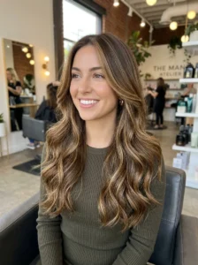 Blowout balayage California brunette hairstyle with soft volume