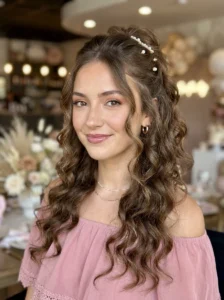 Half up half down curls with face framing pieces birthday hairstyle