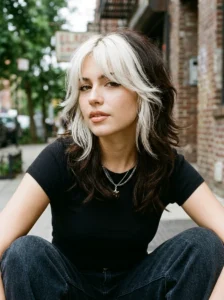 White blonde front panels with layered Y2K hairstyle