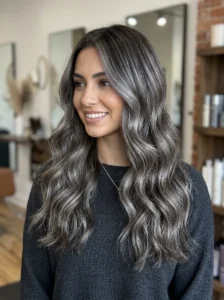 Silver highlights blended through brunette hair