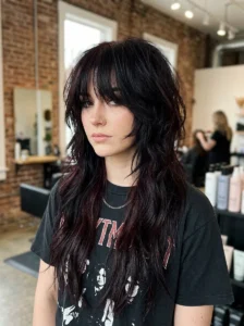 Long layered emo shag hairstyle with movement