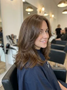 Healthy trimmed thick hair with soft layers