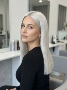 Platinum blonde hairstyle with icy sleek shine