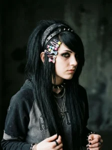 2000s emo hairstyle with colorful hair clips, studded headband, and bandana