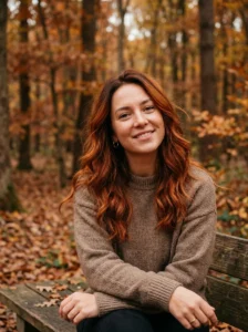 Woman with earthy burnt sienna orange-red hair inspired by fall foliage.