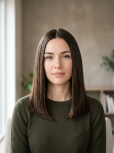 Sleek straight medium length haircut with glossy healthy hair