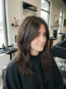 Deep chocolate brown wolf cut with glossy layered texture