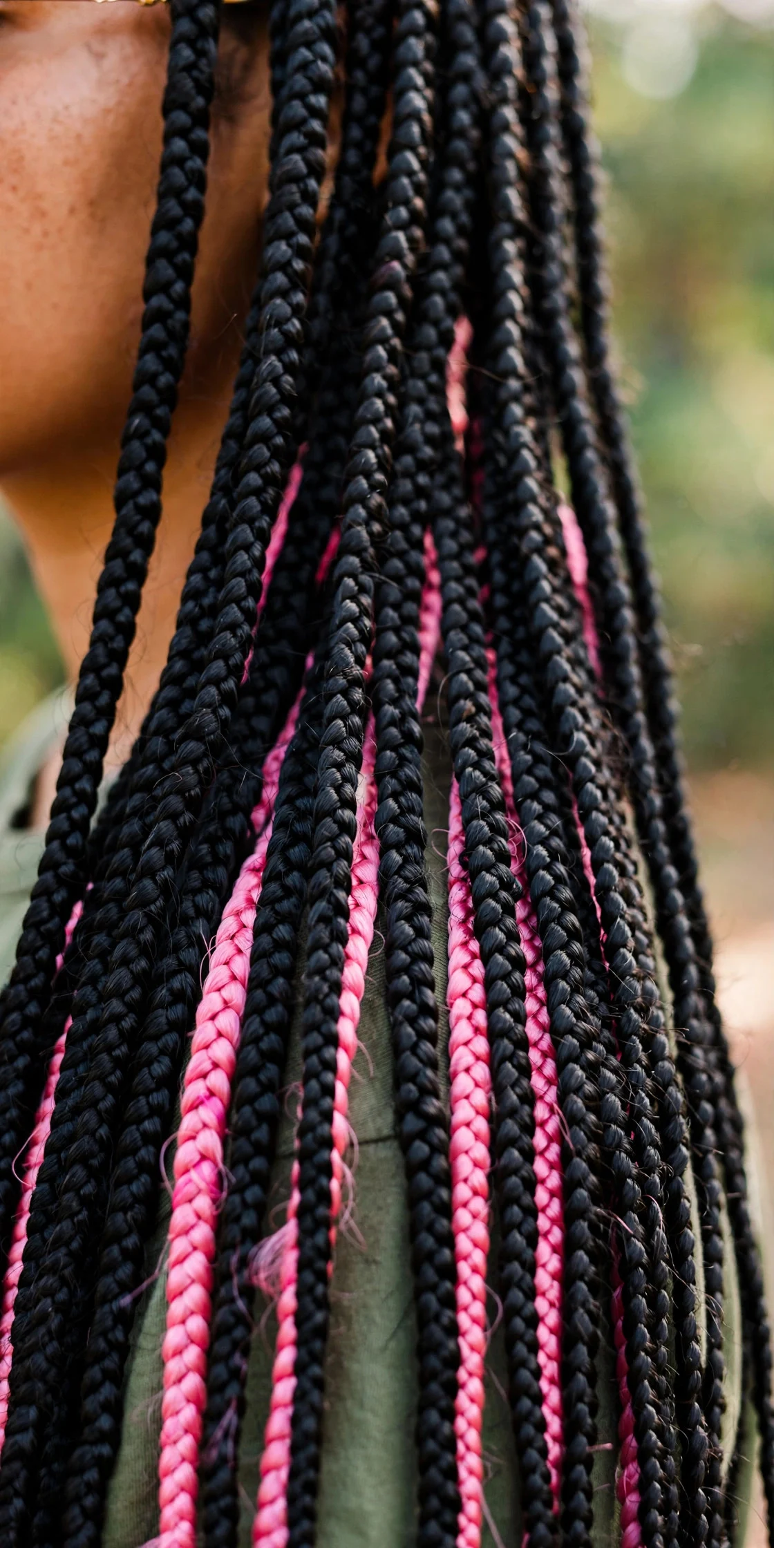 Pink Peekaboo in Long Single Braids hair