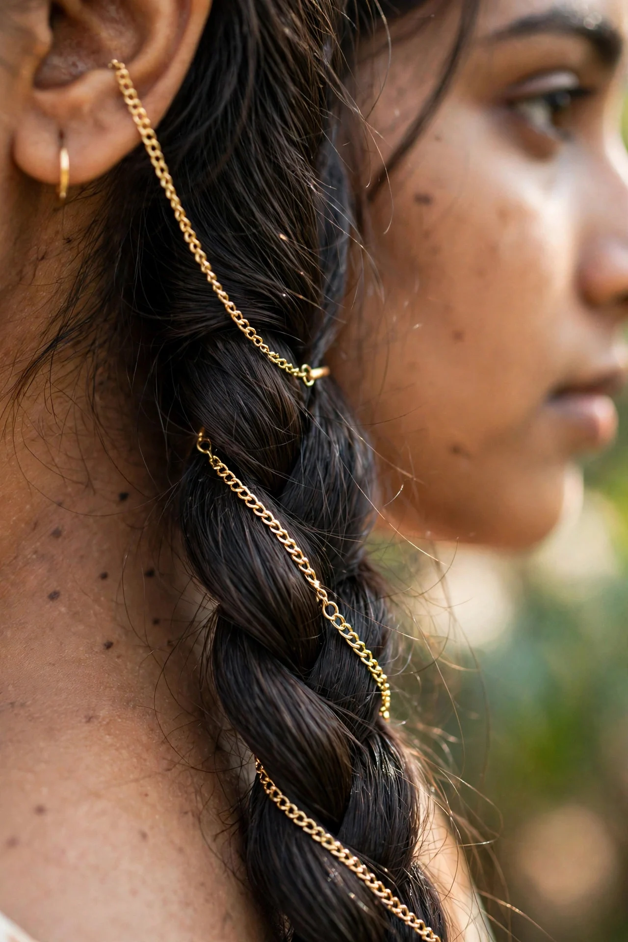 Chain Clipped Into a Side Braid hair